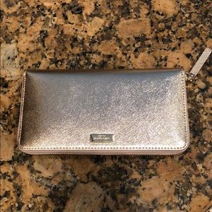 Kate Spade Rose Gold wallet. Laurel way.